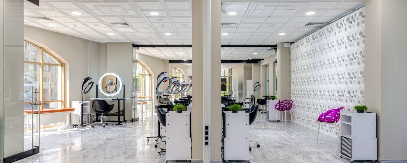 Modern hair salon interior with styling stations